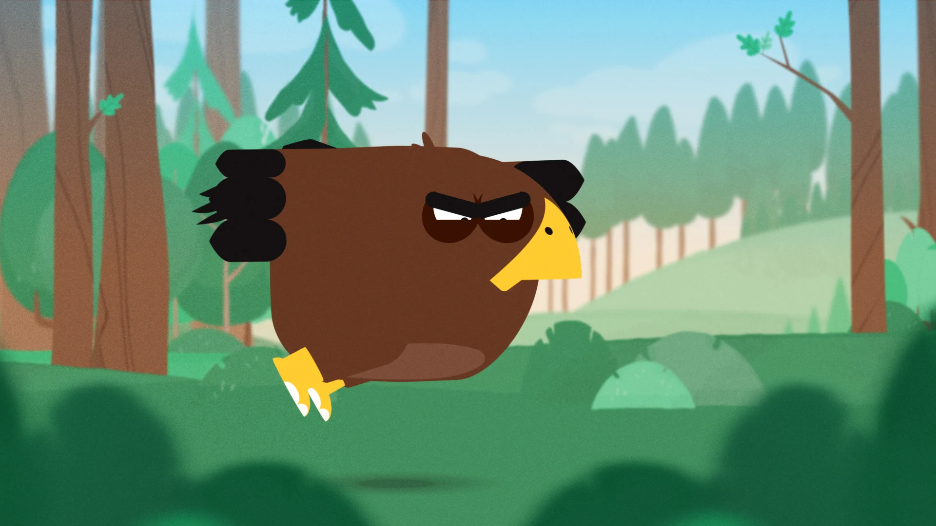 A brown eagle flying through the woodland.