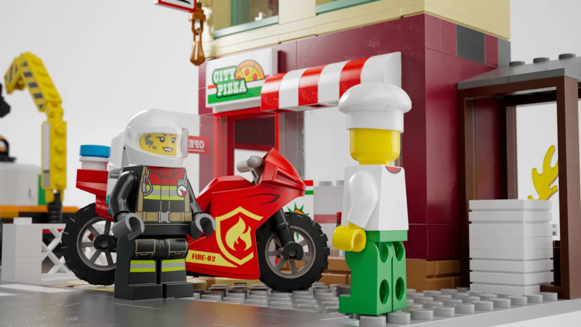 A firefighter and pizza chef outside the LEGO pizza restaurant