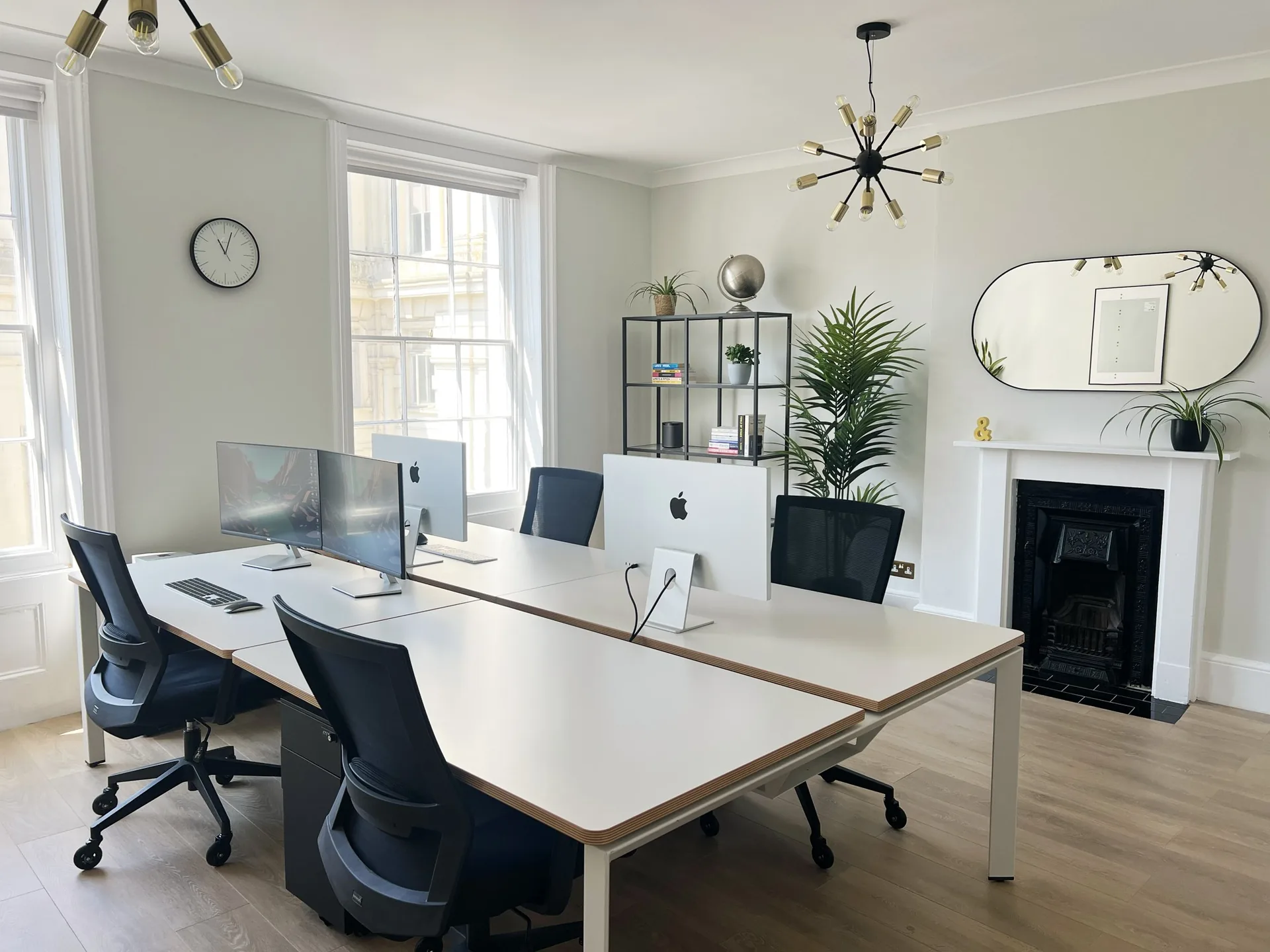MOVE’s bright Bartholomews studio with shared desks, large windows and plants