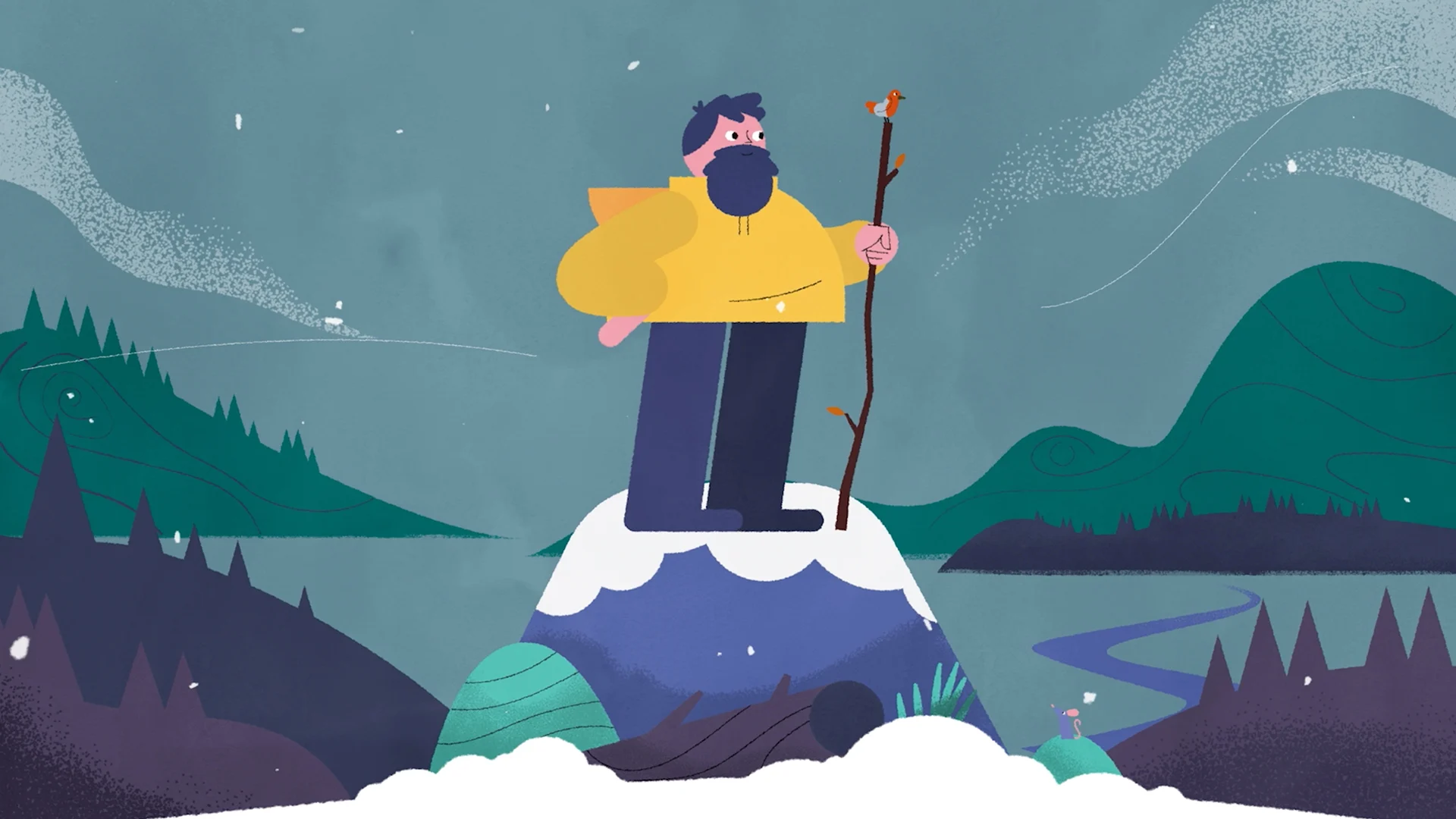 The man standing on a snowy rock above rolling hills and a winding river.